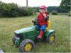 Kind mit Trettrecker